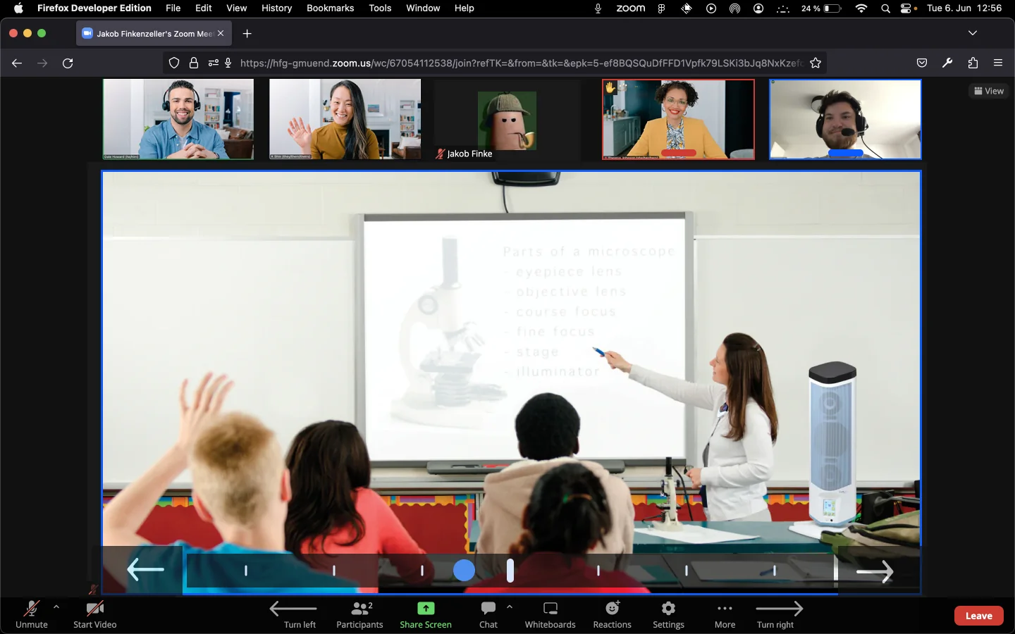 StuReBot directional controls are overlaid on a Zoom classroom view.